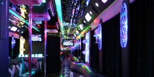 Party Bus Rental Service 50 Person Austin shuttle charter limo buses transportation company texas